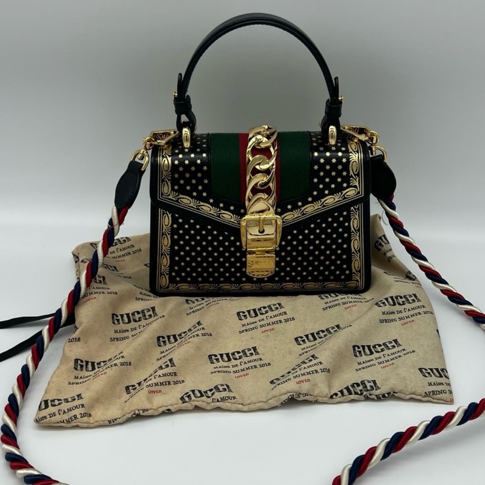 Authentic Gucci limited edition mini Sylvie black metallic gold and stars
